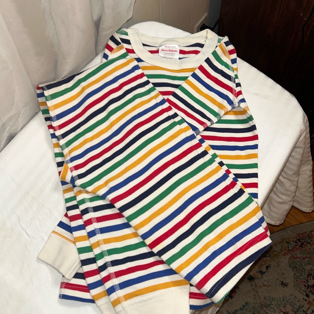 Hanna Andersson Pajama set, Size 10 top, Size 14 bottom.